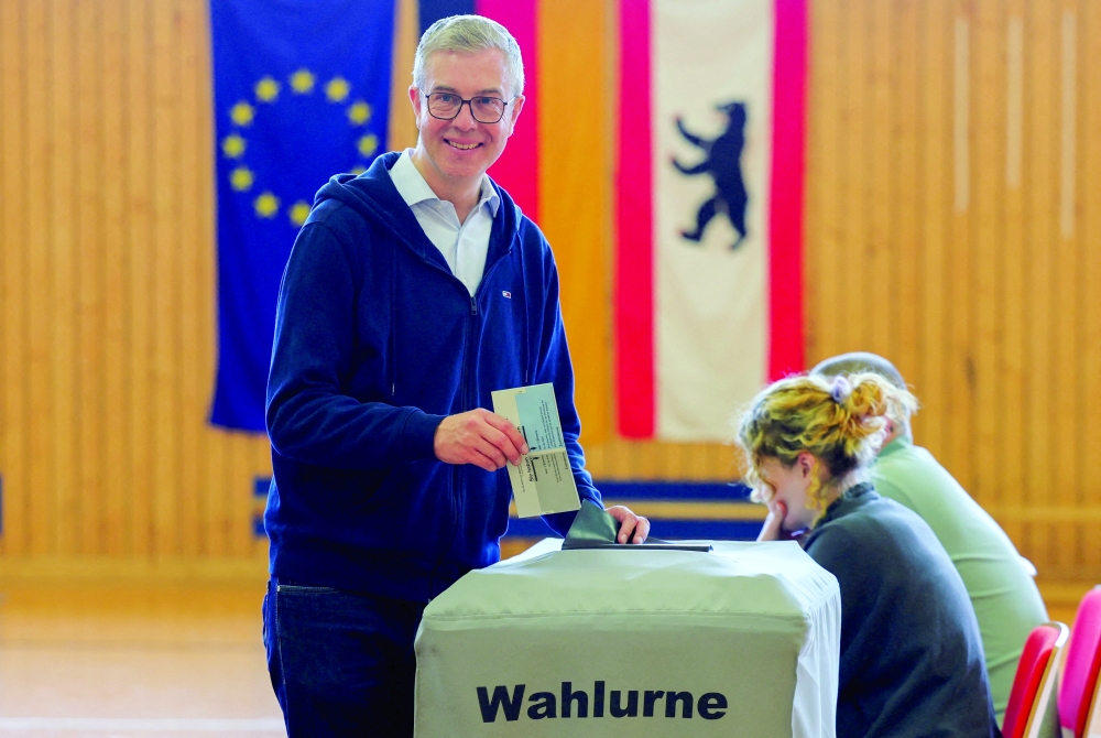 Christian Democratic Union (CDU) party top candidate Stefan Evers votes during the state election in Berlin. — Reuters 