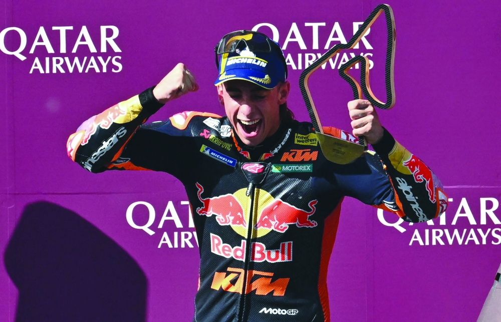 Spanish driver Pedro Acosta celebrates on the podium after the MotoGP Grand Prix of Austria. — AFP
