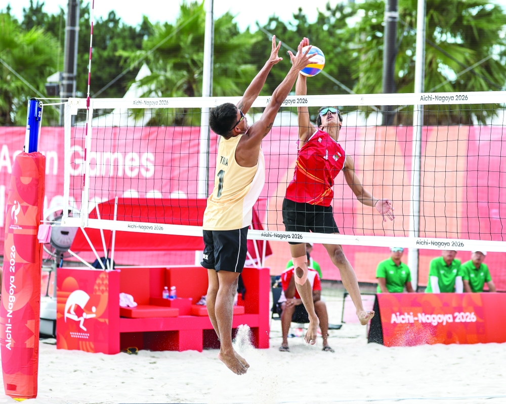 Oman’s Ahmed al Hosni and Khalfan al Maamari in action against Thailand in the beach volleyball competition at the 20th Asian Games Aichi-Nagoya 2026.