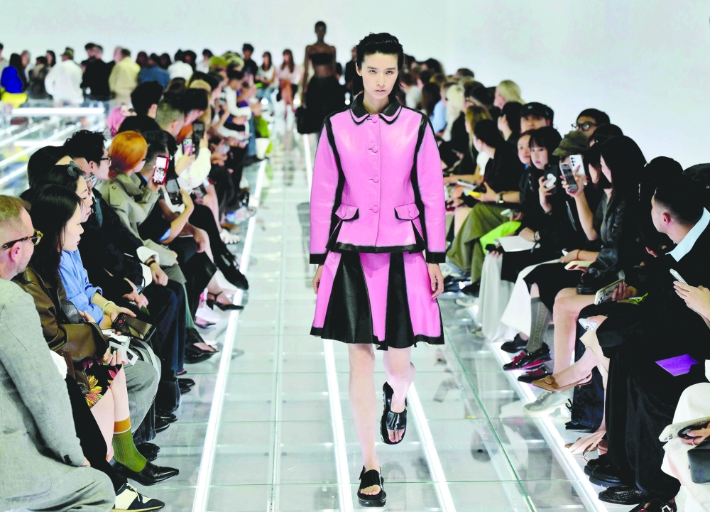 A model walks the runway during the Prada collection show as part of Women's Spring/Summer 2027 Milan's fashion week. -AFP 
