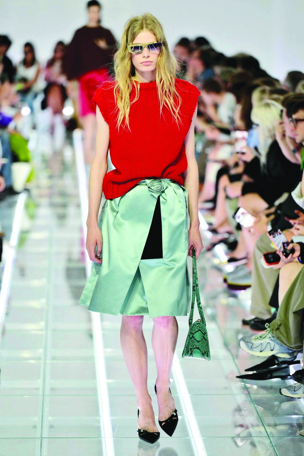 A model walks the runway during the Prada collection show as part of Women's Spring/Summer 2027 Milan's fashion week. -AFP 