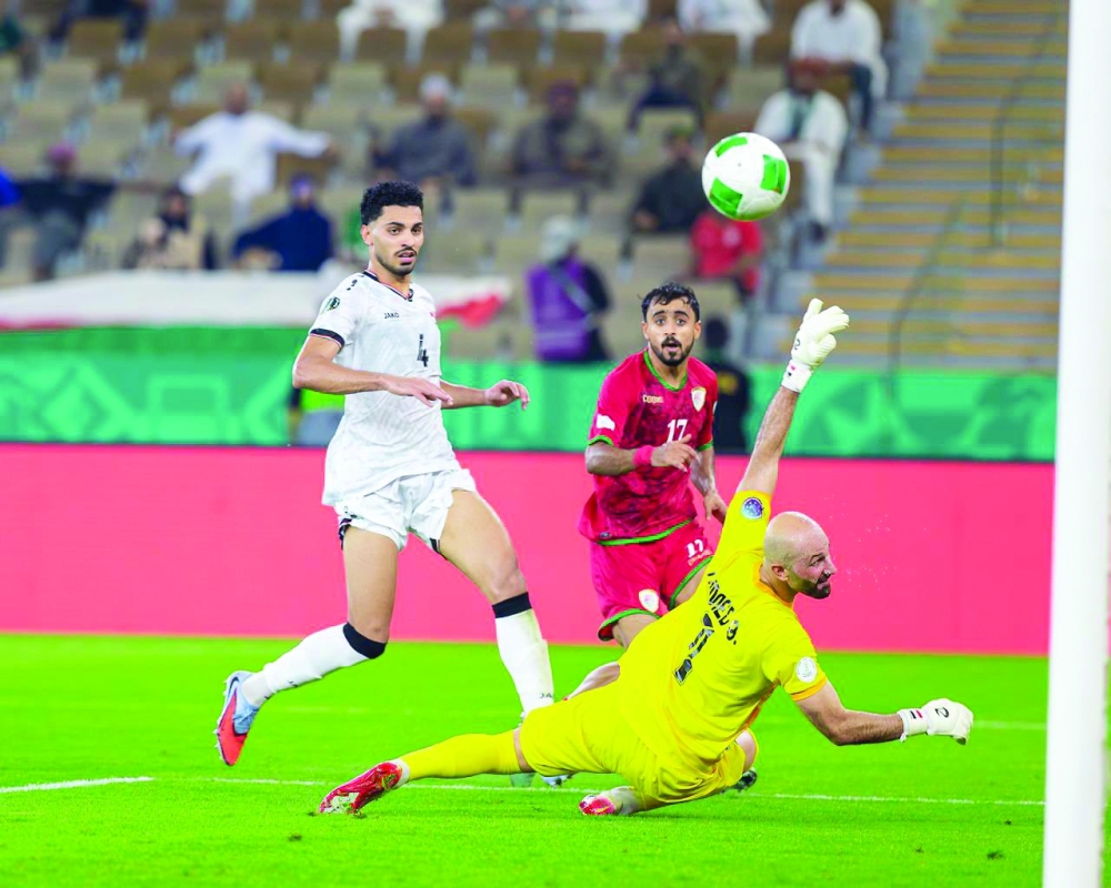 Nasser al Rawahi scores the equalising goal for Oman.