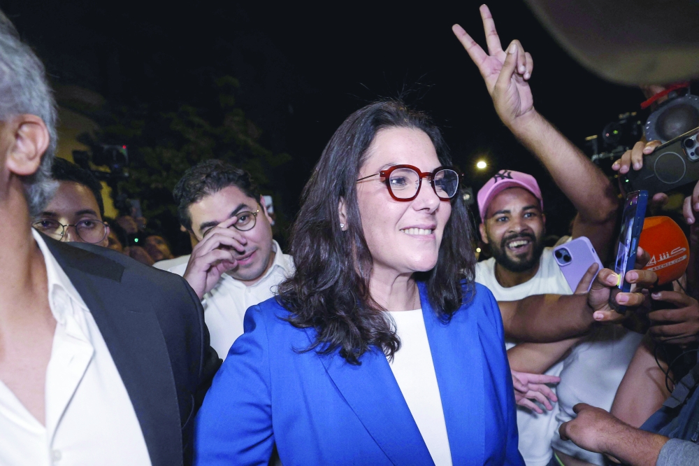 
Fatima Zahra Al Mansouri (C), member of Morocco’s Authenticity and Modernity Party (PAM), celebrates after the announcement of results of the legislative elections on Thursday. — AFP 