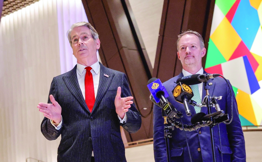 US Treasury Secretary Scott Bessent speaks as US Trade Representative Jamieson Greer (R) during a media briefing after a meeting with China's Vice-Premier He Lifeng in New York. - AFP