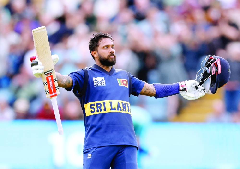 Sri Lanka's Kusal Mendis celebrates reaching his century during the second ODI against England at Leeds. — Reuters