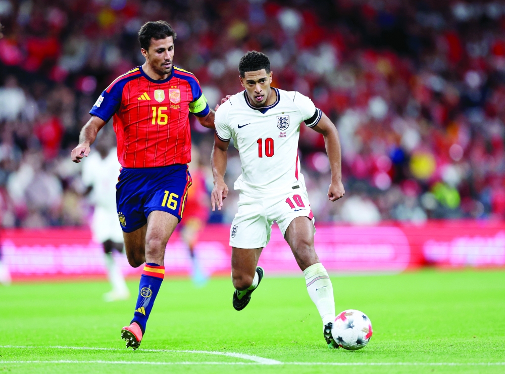 England's Jude Bellingham in action with Spain's Rodri. — Reuters