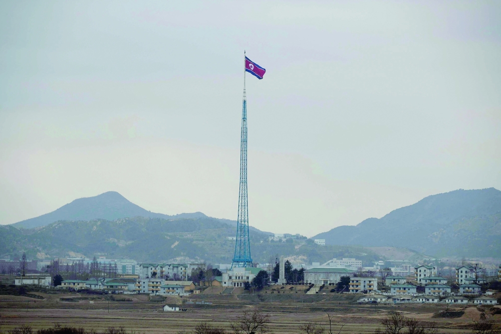 North Korean village "Gijungdong" is seen from a South Korea's observation post. — Reuters
