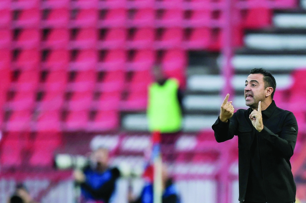 Netherlands' head coach Xavi Hernández gives instructions to his players during the UEFA Nations League Group A2 football match between Serbia and Netherlands at the Rajko Mitic stadium. — AFP