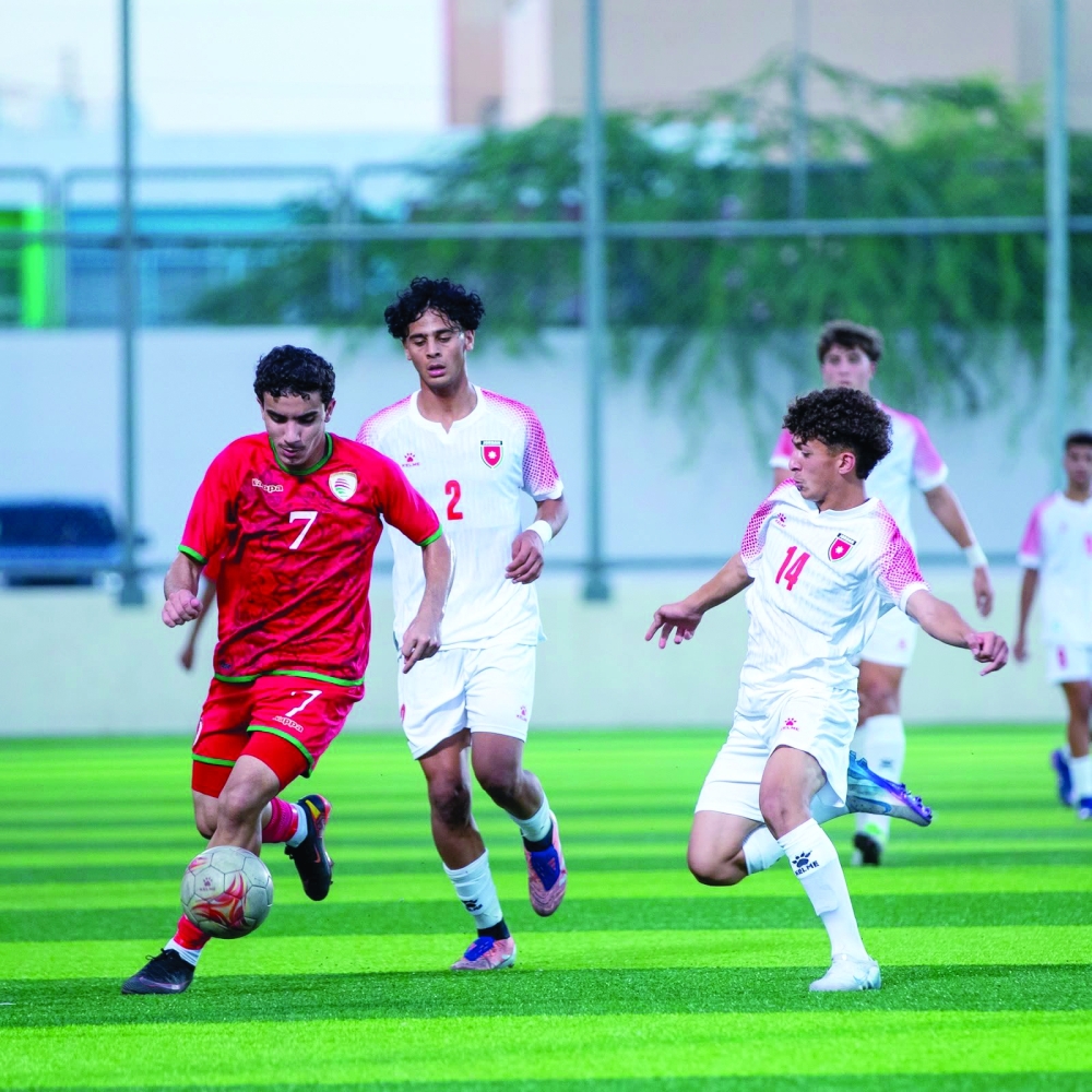 Oman U17 players during a competitive Group B encounter against Jordan at Aqaba Stadium.