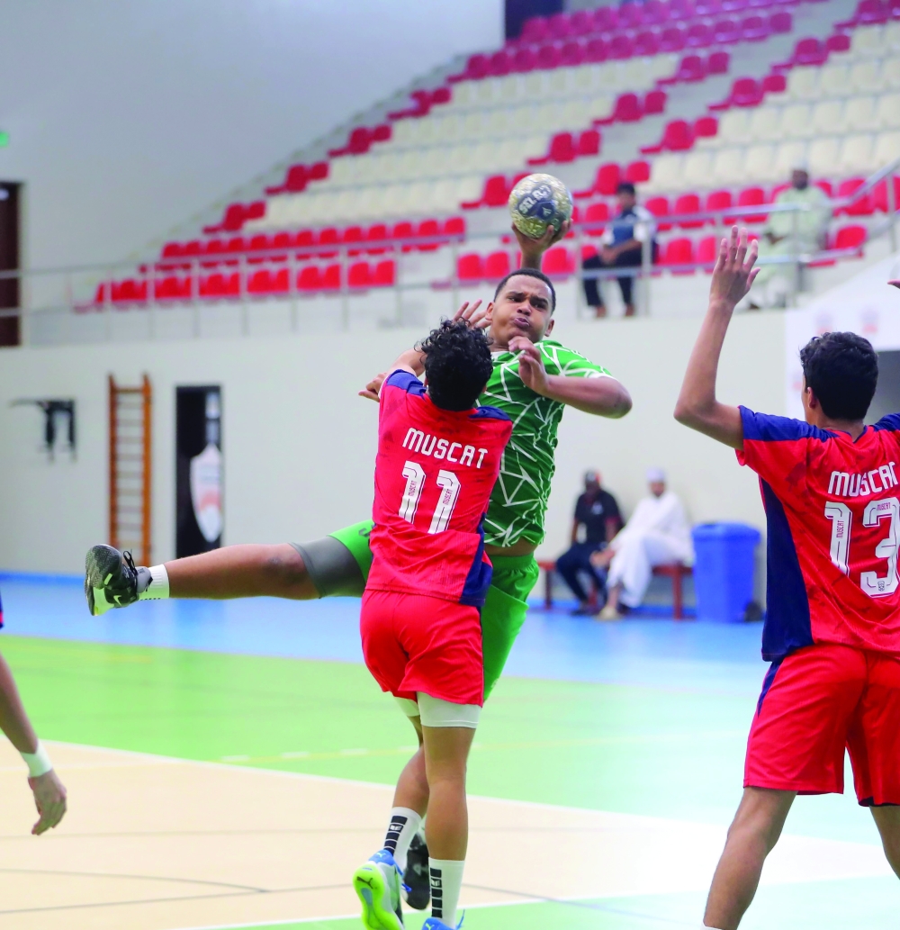 Muscat and Al Ittihad players in action during the Oman Junior Handball League.