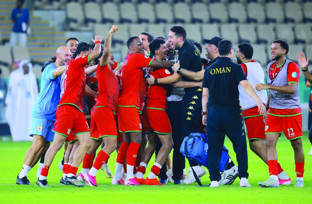 Oman players celebrate after the Group A Gulf Cup match against Kuwait at Prince Abdullah Al Faisal Sports City Stadium, Jeddah, Saudi Arabia. — Reuters