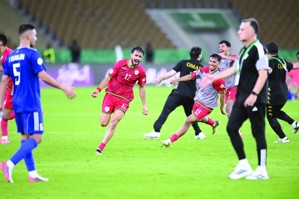 Oman's Nasser al Rawahi celebrates after the match against Kuwait. — Abdulwahid al Hamadani