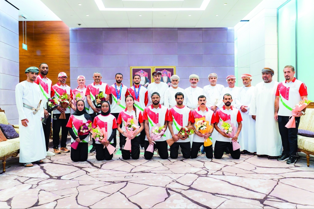 The Oman athletics team during the reception at the Muscat International Airport.