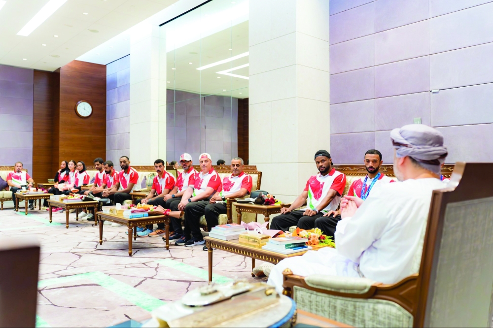 The Oman athletics team during the reception at the Muscat International Airport.