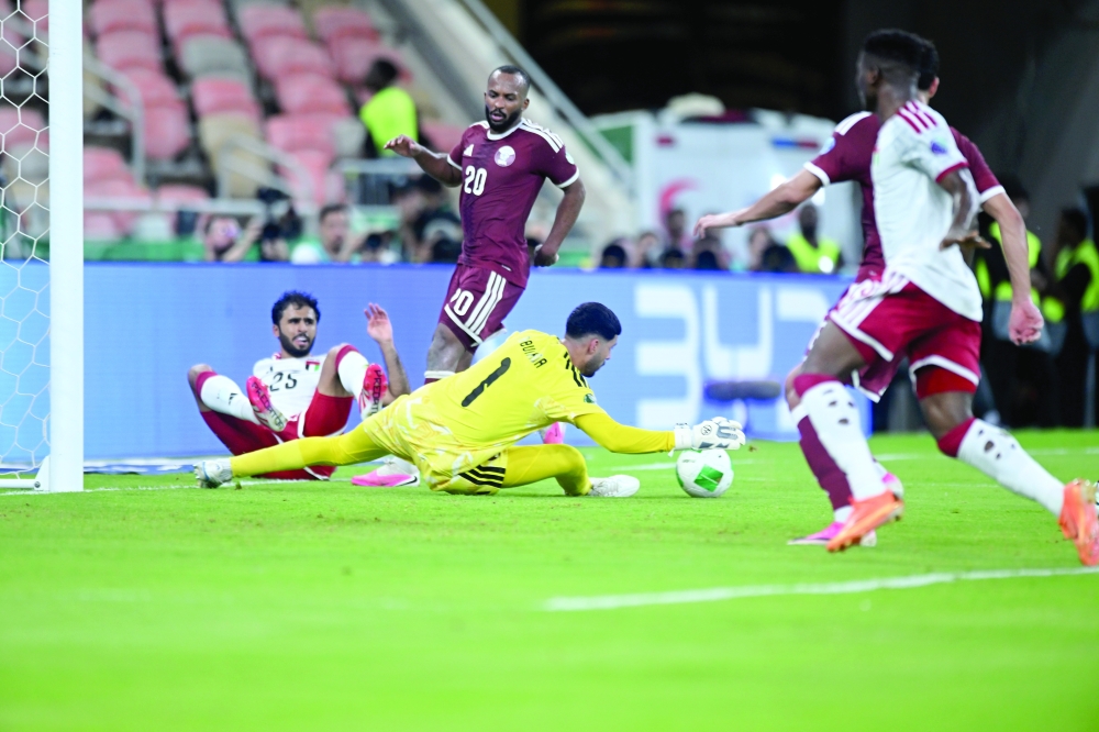 Qatar and the UAE players in action during their Group B match. — Abdulwahid al Hamadani