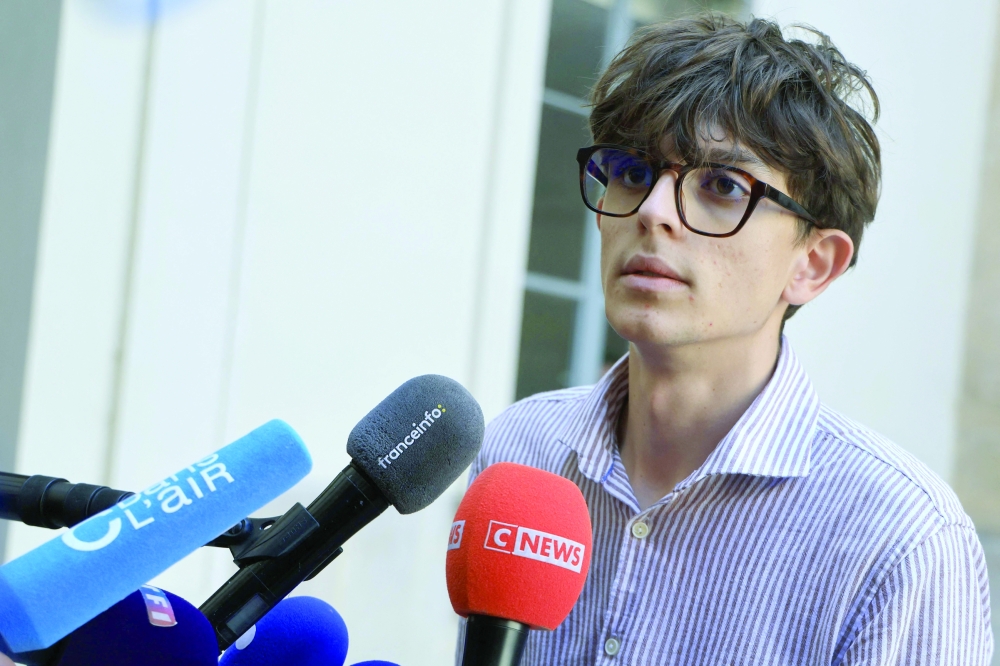 Les Lyceens vice-president Louis Letoublon speaks ahead of a meeting between French Education Minister and representatives of student organisations at the ministry in Paris. — AFP