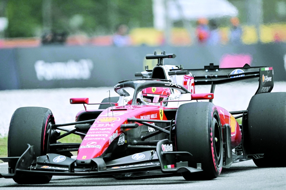 Ferrari's Monegasque driver Charles Leclerc drives during the second practice session ahead of the Formula One Bahrain Grand Prix in Sepang on October 2, 2026. (Photo by Lillian SUWANRUMPHA / AFP)
