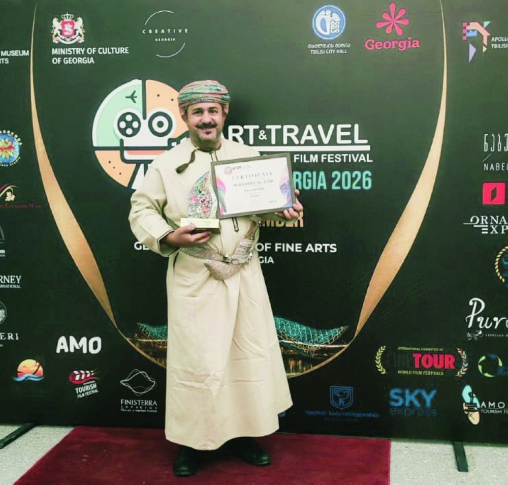 Film-maker Mohd al Kindi with his honour.