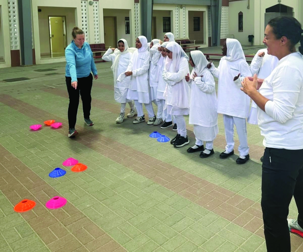 Schoolgirls develop leadership skills through practical sports activities.