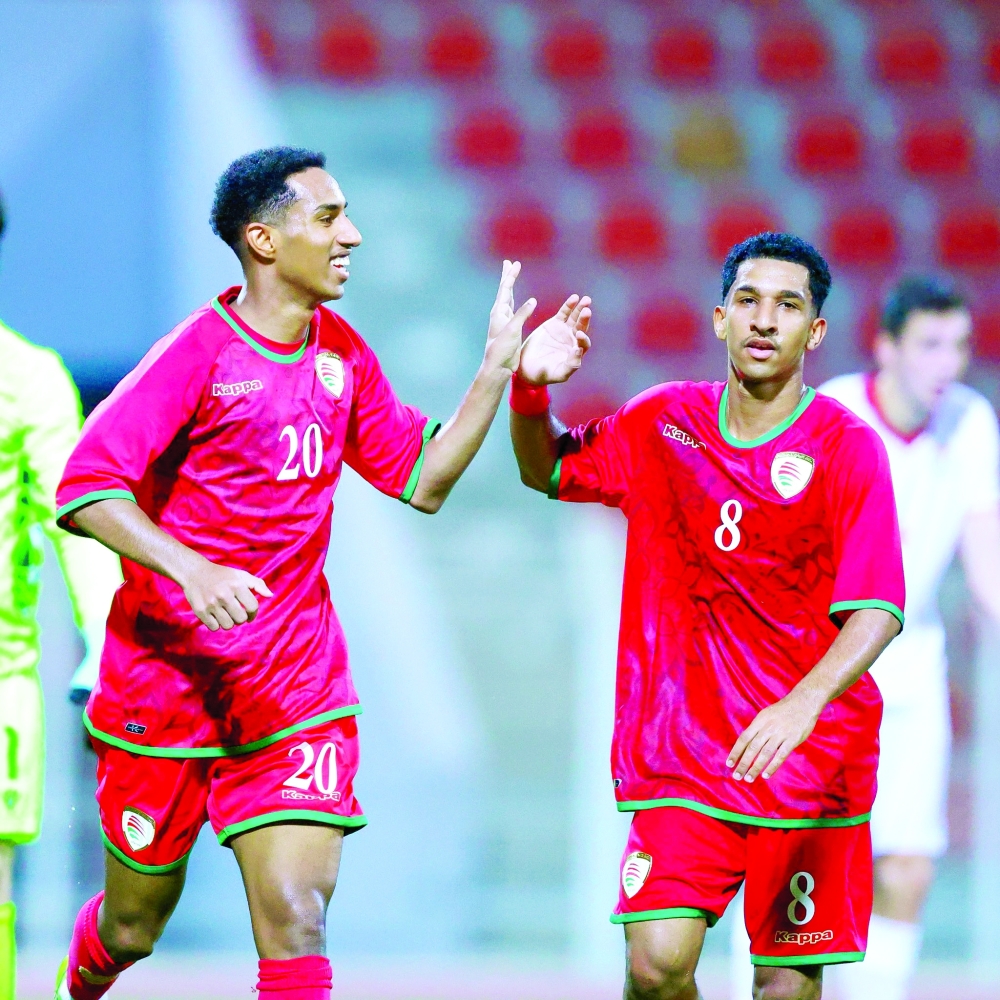 Oman Olympic team players celebrate during the friendly against Tajikistan at Sultan Qaboos Sports Complex.