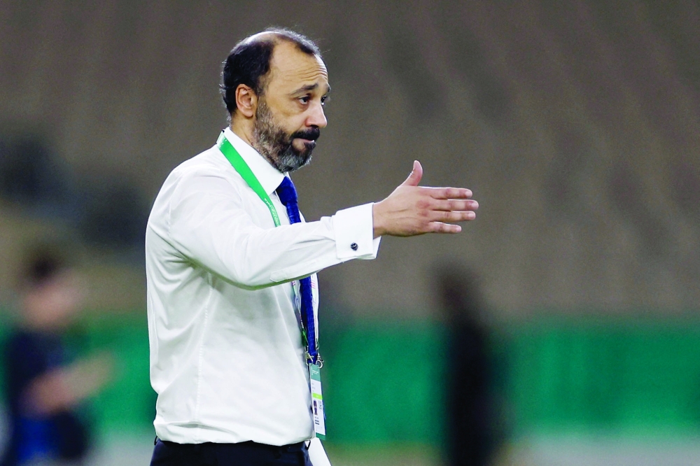Oman coach Tarik Sektioui reacts. — Reuters