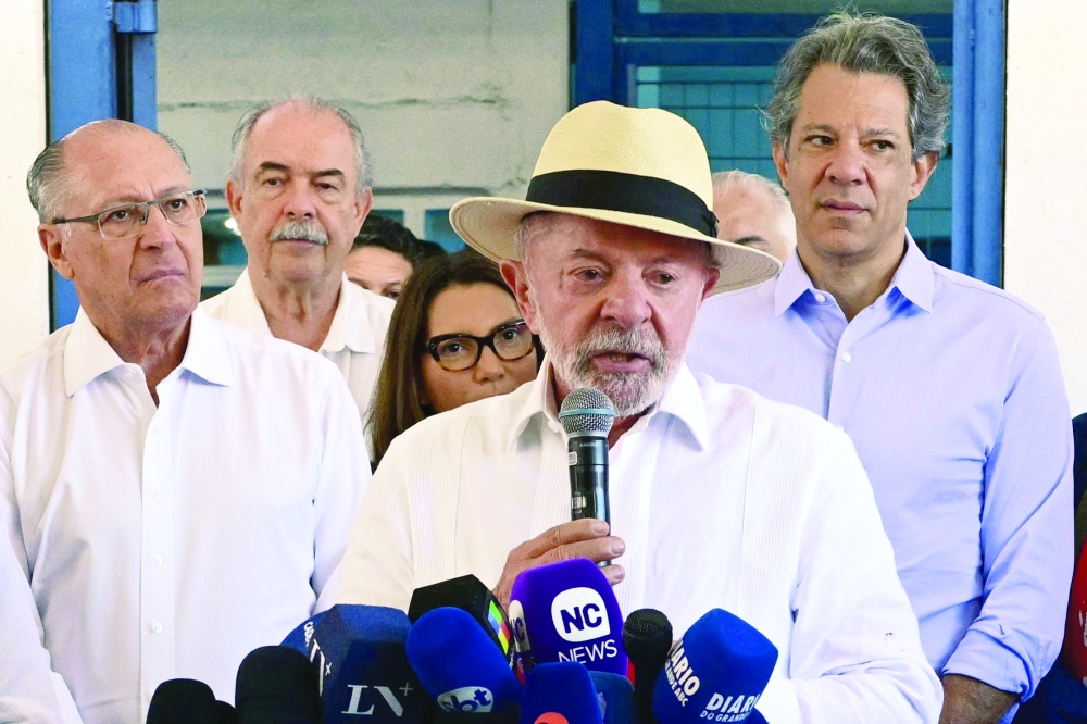 Brazil's President and re-election candidate for the Workers' Party (PT) Luiz Inacio Lula da Silva speaks to the media at a polling station in Sao Bernardo do Campo, state of Sao Paulo. — Reuters 