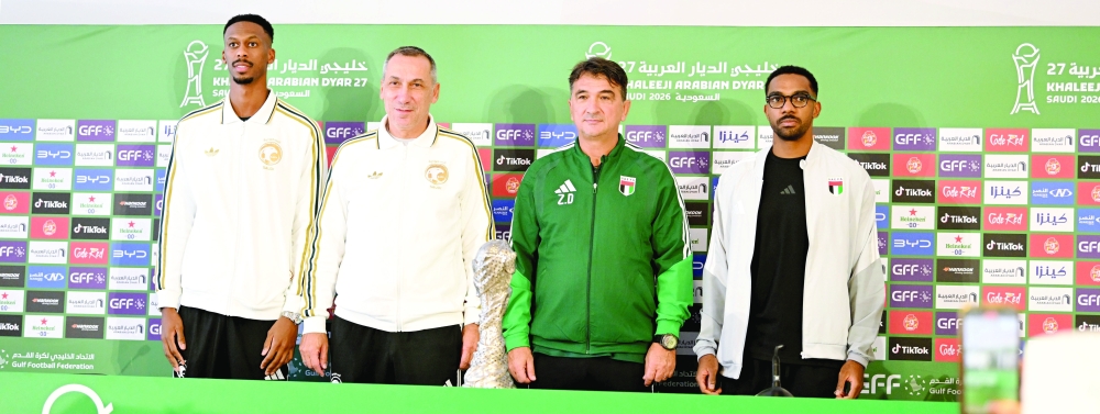 Saudi Arabia head coach Georgios Donis and UAE head coach Zlatko Dalic pose with the Gulf Cup trophy ahead of the final in Jeddah. — Abdulwahid al Hamadani