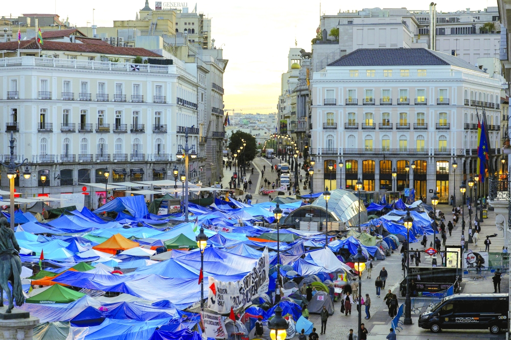 Protesters camp in Puerta del Sol, where they are demanding political measures to address the housing crisis in Madrid. — Reuters 