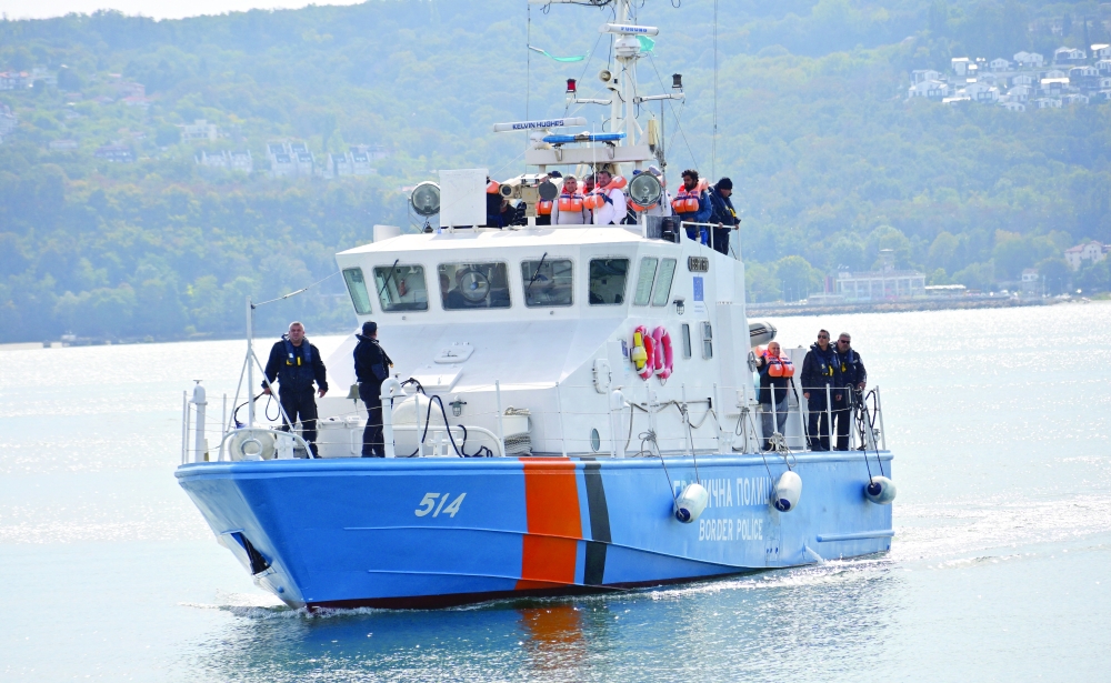 A Bulgarian police vessel carrying crew members from a ship damaged in a drone attack, in Varna. — Reuters 
