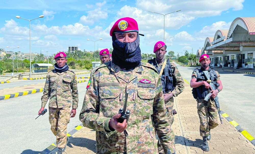 Members of the Republican Guards patrol outside the terminal at the Mekelle Alula Aba Nega International Airport on the outskirts of Mekelle. — Reuters