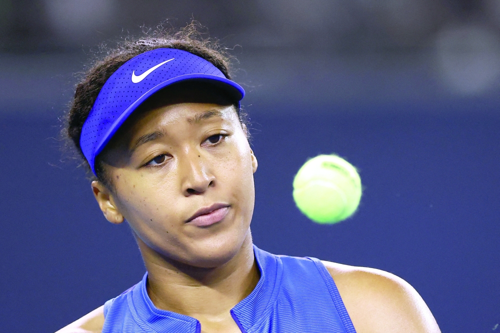 Japan's Naomi Osaka reacts during her Round of 64 match against Russia's Maria Timofeeva at China Open in Beijing. — Reuters