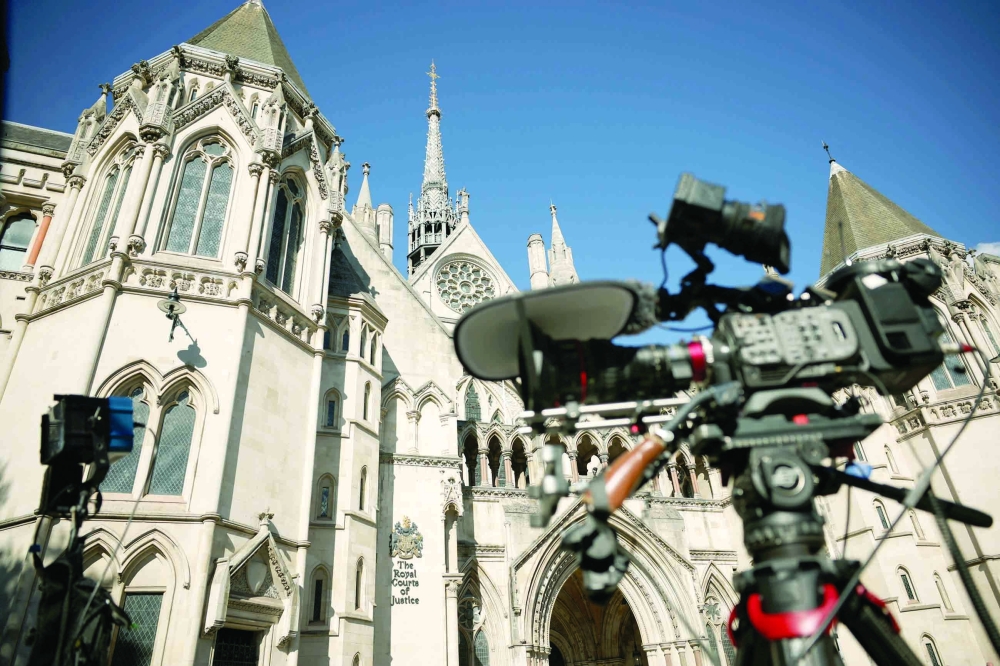 Media equipment outside the High Court in London on Thursday, during a hearing in the case brought by Andrew Mountbatten-Windsor over the search warrants. — Reuters