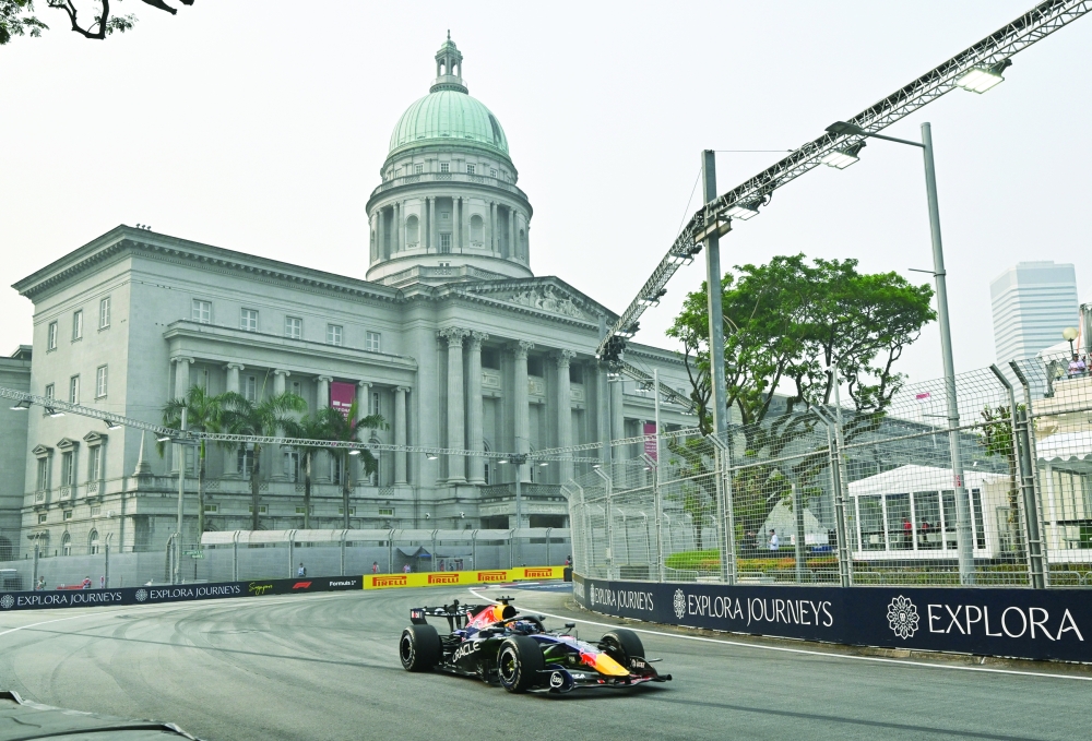 Red Bull's Max Verstappen in action during practice for Singapore Grand Prix at Marina Bay Street Circuit, Singapore. — Reuters