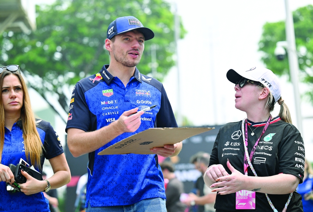 Red Bull's Max Verstappen arrives ahead of practice for Singapore Grand Prix at Marina Bay Street Circuit, Singapore. — Reuters