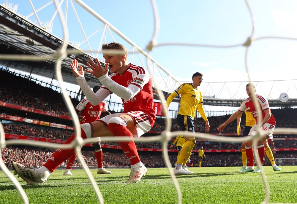  
Arsenal's Martin Odegaard reacts. — Reuters