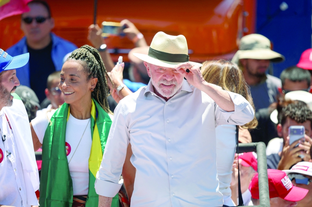 Brazilian President Luiz Inacio Lula da Silva, the Workers' Party (PT) candidate for reelection attends a campaign rally in Brasilia. — Reuters 