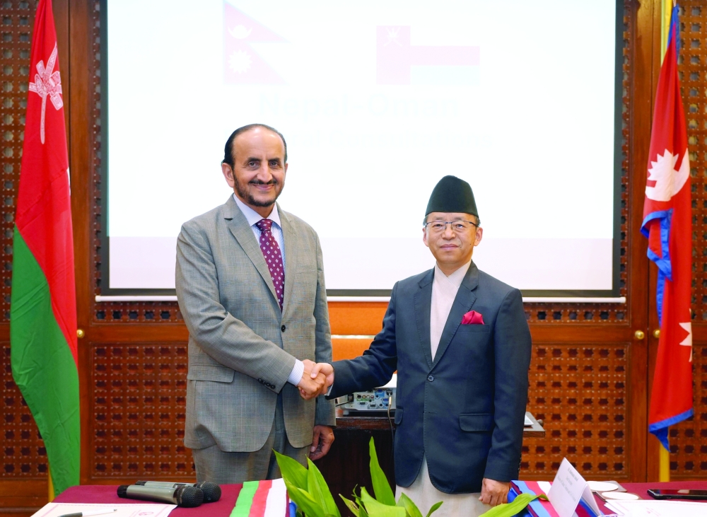 Shaikh Khalifa bin Ali al Harthi with Amrit Bahadur Rai, Foreign Secretary of Nepal, in Kathmandu on Friday. — ONA