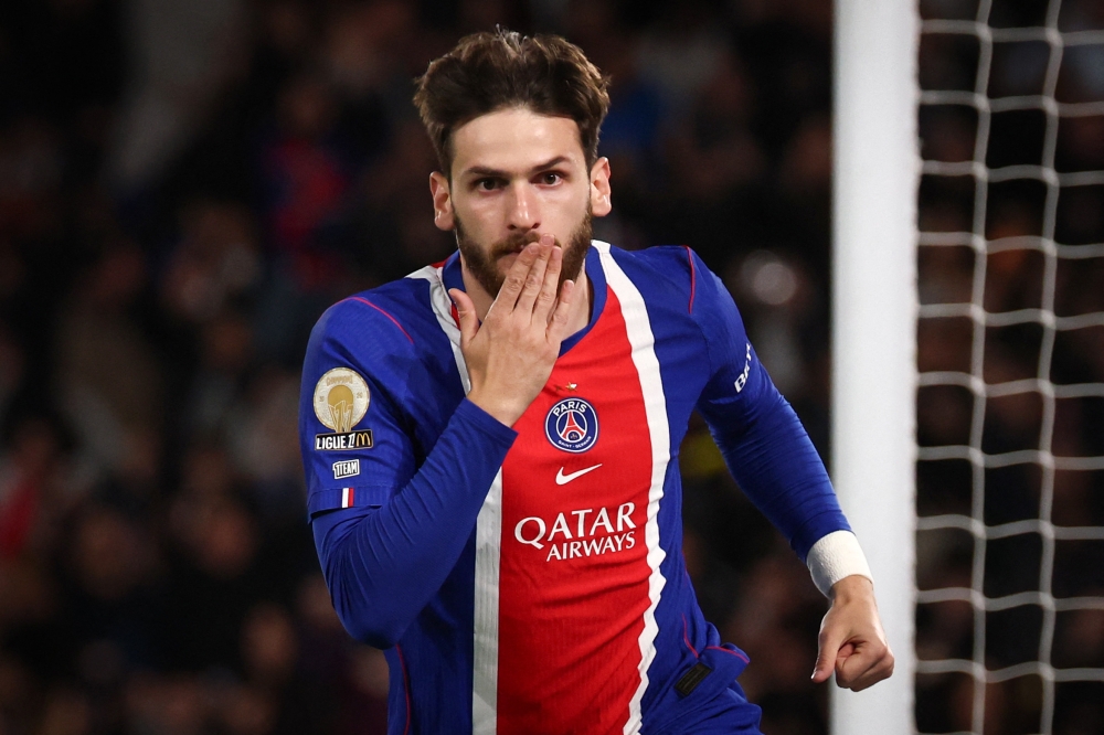 PSG's Georgian forward #07 Khvicha Kvaratskhelia celebrates after scoring Paris Saint-Germain's second goal 