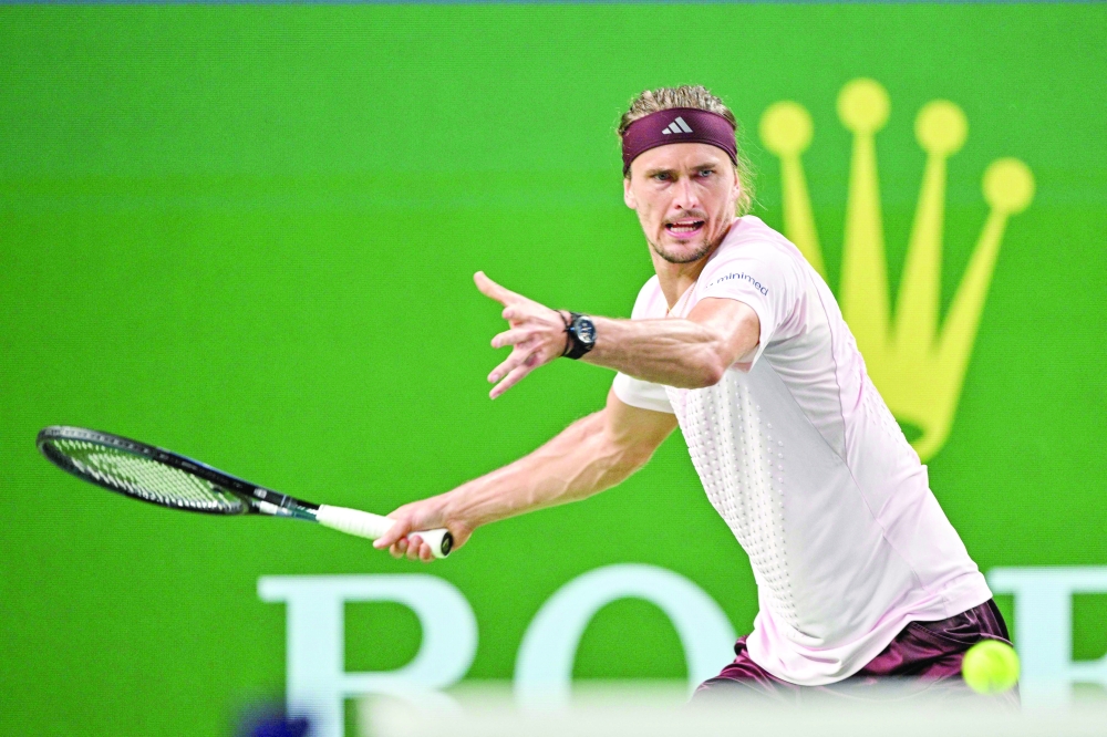 Germany's Alexander Zverev hits a return to France's Quentin Halys during their men's singles match at the Shanghai Masters tennis tournament in Shanghai. — AFP