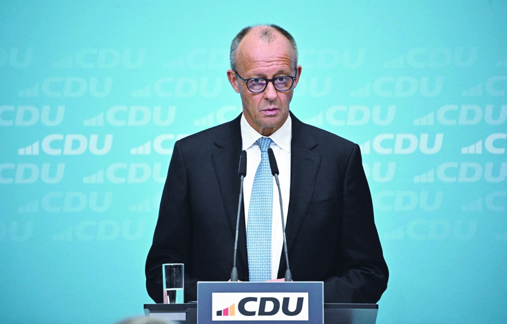 German Chancellor Friedrich Merz addresses journalists after a meeting with his conservative Christian Democratic Union (CDU) party's leadership. — AFP