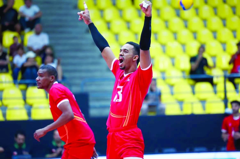Oman players celebrate during their unbeaten campaign at the Arab Men’s Volleyball Championship in Amman.