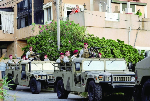 Lebanese army seizes more explosives as PM vows firm response