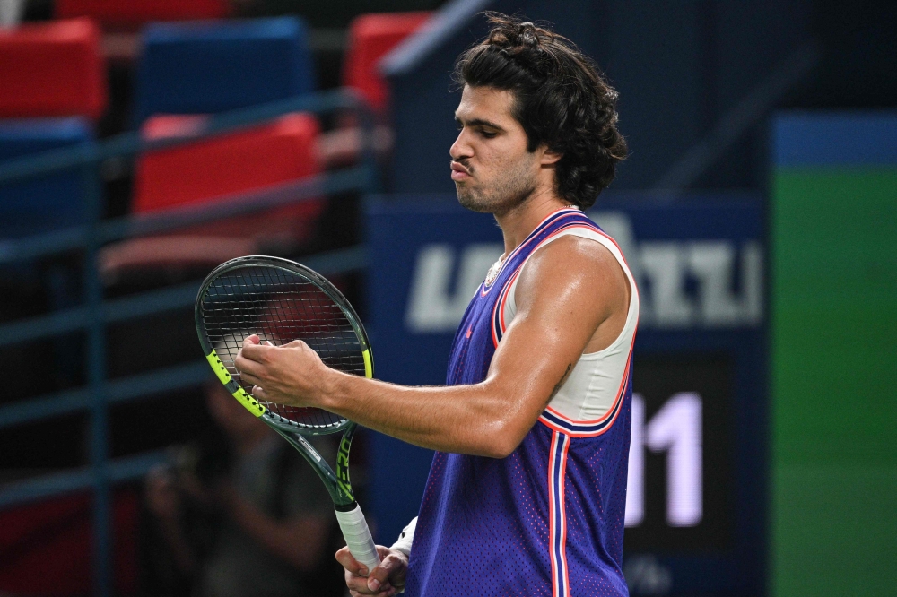 Spain's Carlos Alcaraz reacts during his men's singles match against Belgium's Zizou Bergs  
