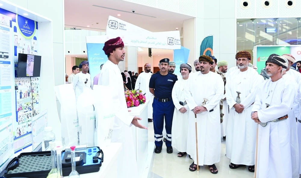 Officials tour the exhibition in Salalah on International Day for Disaster Risk Reduction. — ONA
