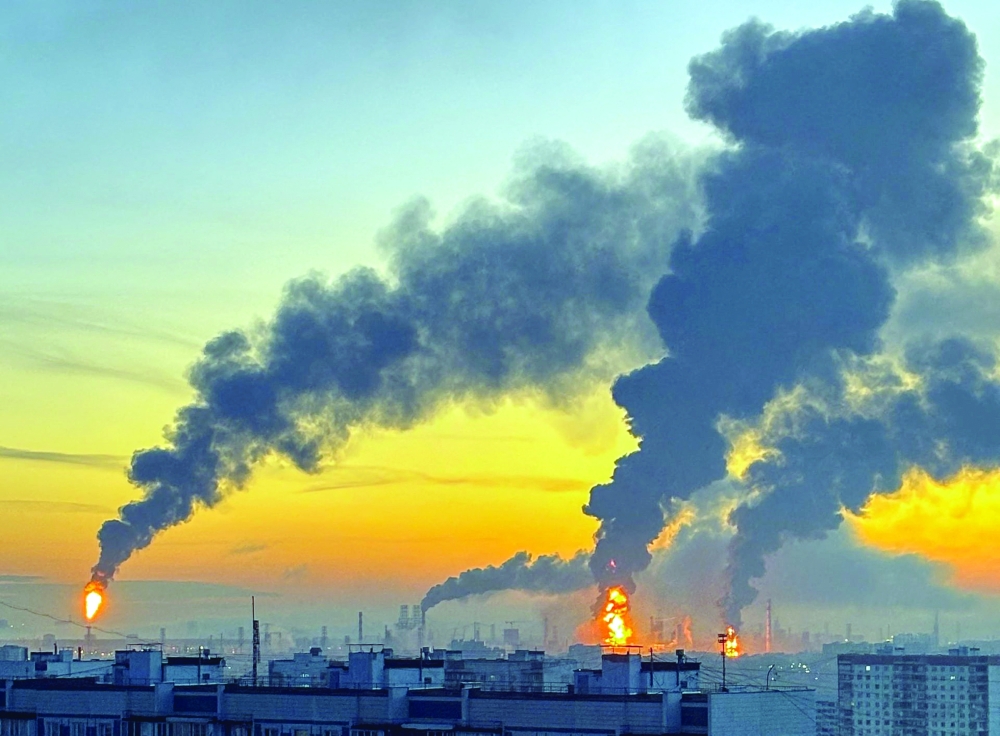 Smoke rises from an oil refinery in Moscow after what authorities said was a Ukrainian drone strike in September. — Reuters file photo