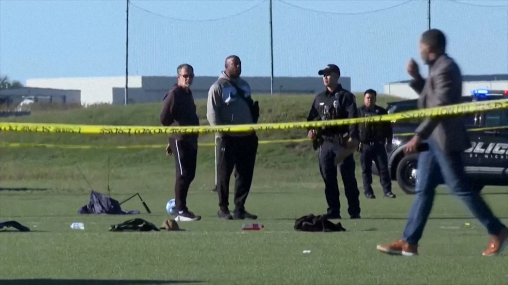 Police attend the scene where a vehicle drove through a soccer game at the Stryker Sports Complex in Wichita 
