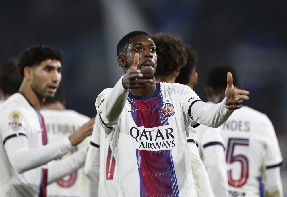  
Paris St Germain's Ousmane Dembele celebrates scoring their second goal  