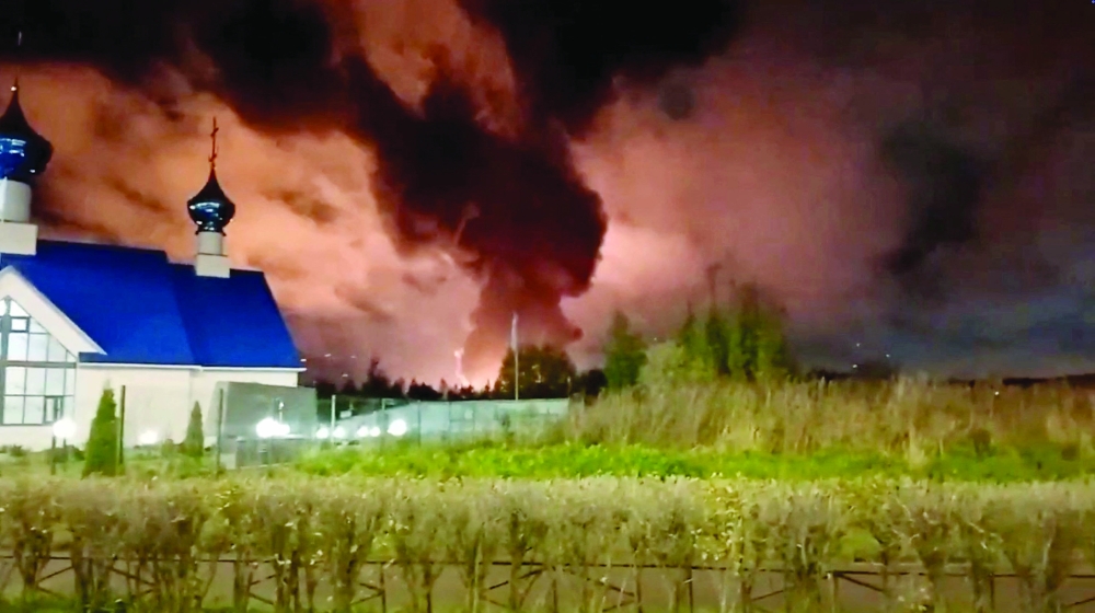 Fire and smoke rise near the St. Petersburg oil terminal, St. Petersburg, Russia. — Reuters 