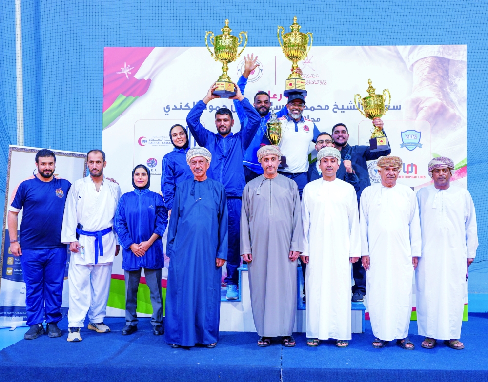 Karate Champions Club celebrate winning the overall title at the 16th Oman Karate Championship. — Faisal al Balushi 