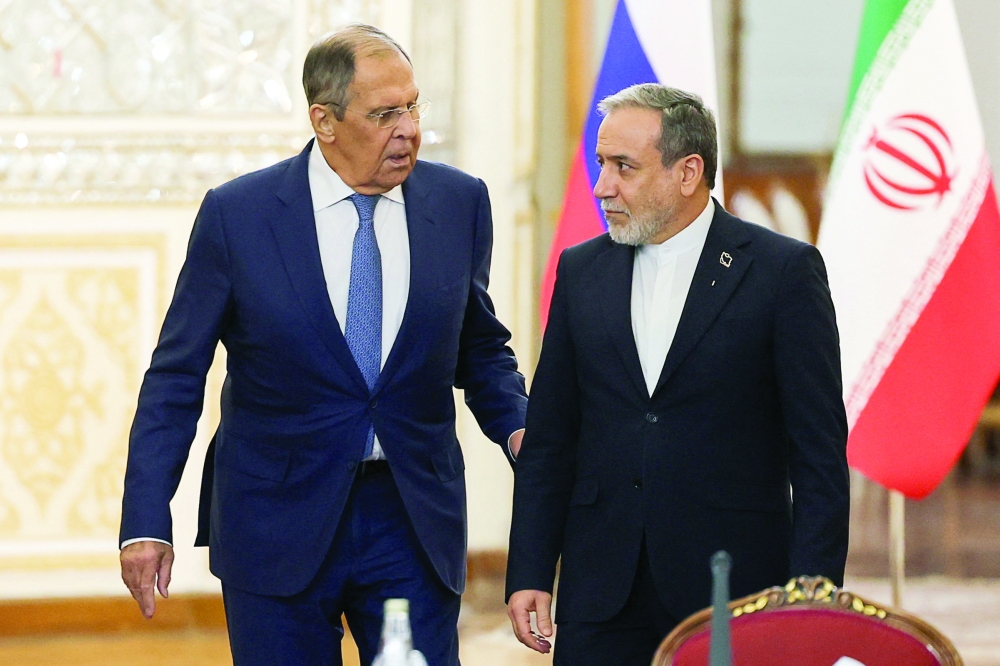 Iran's Foreign Minister Abbas Araghchi meets with Russia's Foreign Minister Sergei Lavrov in Tehran, Iran. — Reuters